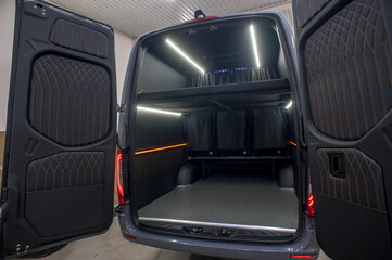 Comfortable interior of a passenger bus with soft seats