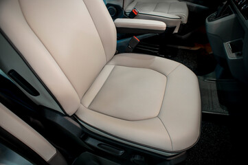 Comfortable interior of a passenger bus with soft seats