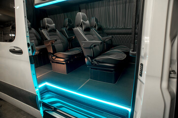 Comfortable interior of a passenger bus with soft seats