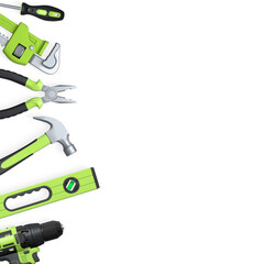 Various hand tools such as saw, screwdriver, hammer, wrench, pliers, and level isolated on white background with clipping path