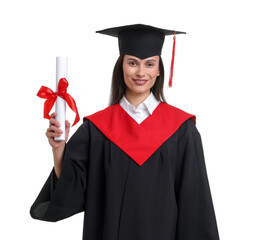 Portrait of happy young woman in graduation gown and mortarboard with diploma on white background