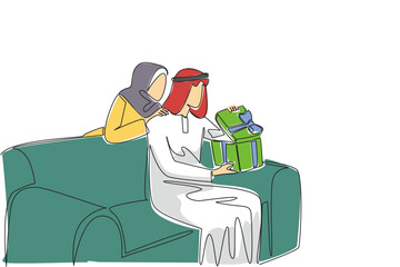 Single one line drawing an arab man sitting on the sofa while opening a gift box. Exchanging gifts fosters feelings of affection. Role model. Surprise. Continuous line design graphic illustration