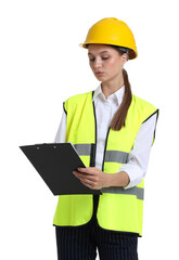 Portrait of engineer in hard hat and reflective vest with clipboard on white background