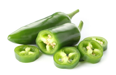 Whole and sliced green jalapeno peppers isolated on white