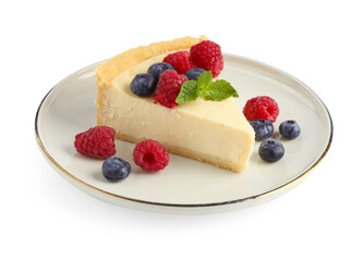 Piece of delicious cheesecake with fresh berries and mint isolated on white