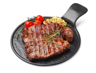 Delicious grilled beef steak with rosemary, zucchini and tomatoes isolated on white