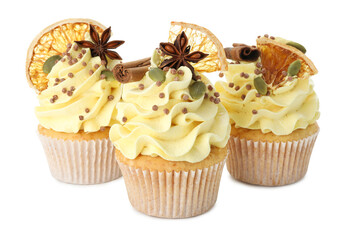 Delicious cupcakes with sprinkles and spices isolated on white. Autumn atmosphere
