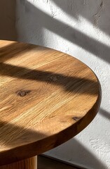 Round Wooden Table in Natural Light: Elegant Simplicity and Rustic Charm with Soft Shadows and Modern Decor