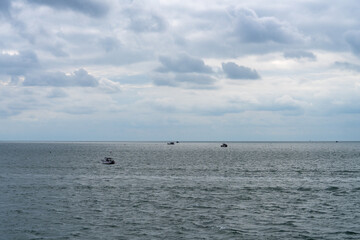 Obraz premium tranquil seascape with fishing boats