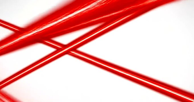 Abstract red lines intersecting on a light background, creating visual tension