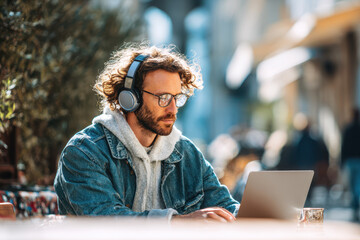 Young Man Enjoying a Sunny Afternoon While Working Outdoors