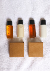 Mini hotel toiletries creating a hospitality environment, offering personal hygiene amenities for travel and guest comfort