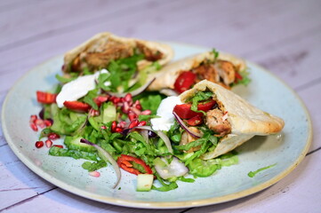 turkish kebab on plate with pita bread