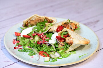 turkish kebab on plate with pita bread