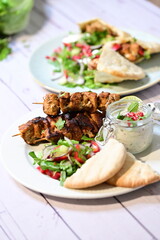 turkish kebab on plate with pita bread
