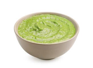 Fresh pesto sauce in bowl isolated on white