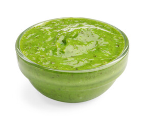 Fresh pesto sauce in bowl isolated on white