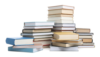 Group of different stacked books isolated on white