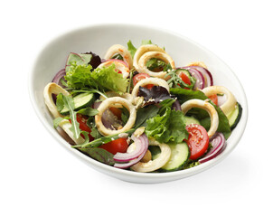 Delicious salad with squid rings and vegetables in bowl isolated on white