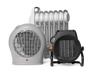 Different modern electric heaters isolated on white