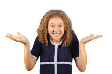 Positive teenage girl with curly hair shrugs with both palms up looks a bit confused and surprised. Uncertain frizzy young woman, adolescent portrait isolated on transparent background