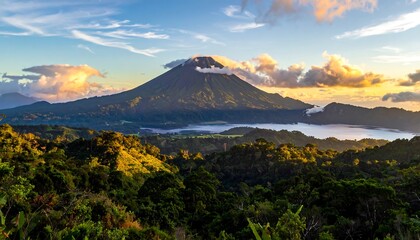 Dramatic Landscape View of a Volcano and Lush Green Forest at Sunrise