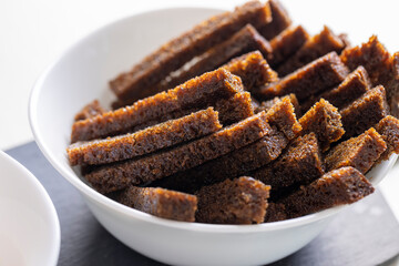 fried bread pieces until crisp in oil with spices, delicious crispy rye bread croutons for cheese sauce
