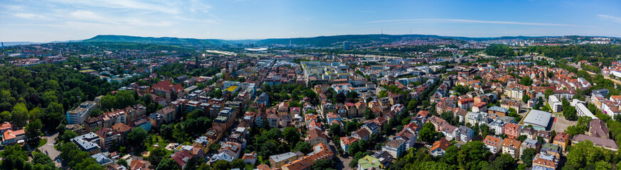 Naklejka premium Aerial panorama view around the city and old town of Bad Cannstatt in Stuttgart, Germany on a sunny summer day.