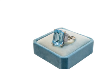Large aquamarine gemstone ring on blue velvet box isolated on transparent background
