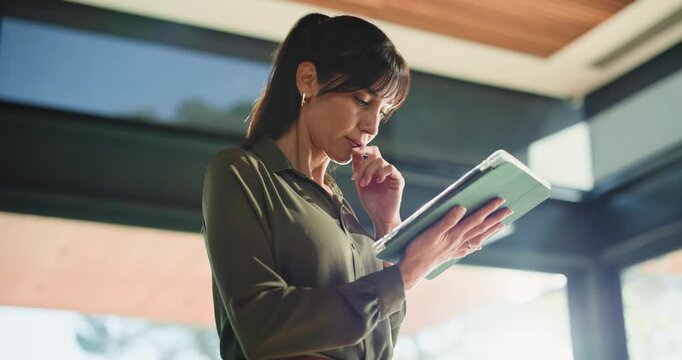 Business, woman and reading with tablet in office for research, proofreading and editor feedback. Below, mature person and digital for editing article, draft update and schedule with publication post