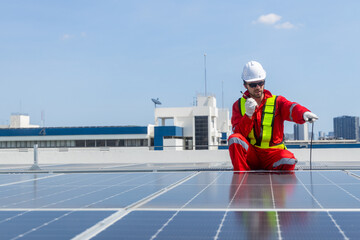 Engineers analyzing rooftop solar panel system data