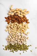 Variety of nuts pistachio cashew almond pumpkin seeds top view food