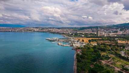 Vibrant Autumn Rainbow Above Izmir's Urban Oasis Sea