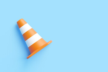 Orange Traffic Cone Isolated on Blue Background