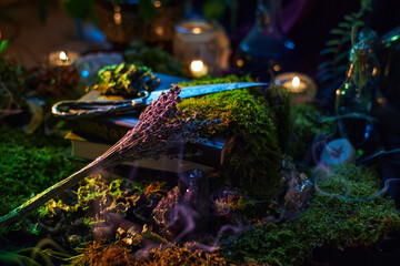 mystical tabletop scene features open books, dried herbs, and glowing candles. Soft smoke lingers as natural elements create a tranquil, magical environment