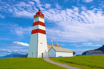 Alnes lighthouse, Alnes island, Norway. It was established in 1852 to guide fishing boats safely to...