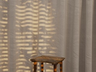  Minimalist Product Display Table with Pinecone and Blinds Shadow on Sheer Curtain Background.