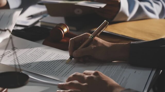 Law theme, mallet of the judge, law enforcement officers, evidence-based cases and documents taken into account.