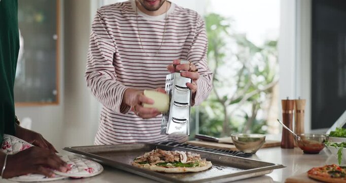 Cheese, grater or hands in kitchen with pizza for dinner, meal preparation or Italian cuisine. Parmesan, garnish or people with flatbread recipe on counter for nutrition, dish or supper in home.