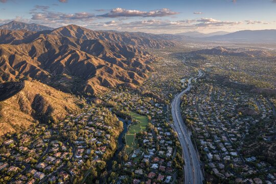 Late Afternoon Aerial Shot of Ventura 101 Freeway Overlooking Encino&acirc;&euro;&trade;s Urban Residential Landscape in San Fernando Valley, Los Angeles, California