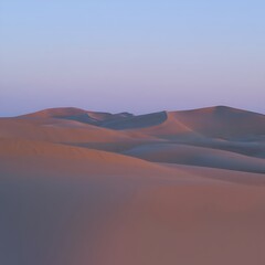 Naklejka premium Serene Sand Dunes at Twilight Evoking Peace and Tranquility Landscape Photography