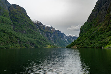 View of Naeroyfjord's peaceful waters and grand scale