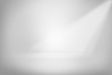Abstract gray gradient studio background, empty room showcase interior wall and floor with white light bright from spotlight. Blank studio for product display