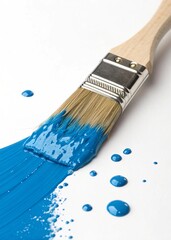 A wooden brush with bristles paints with blue paint