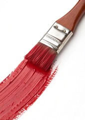 paint brush with red paint on white