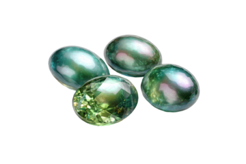 Three vibrant green gemstones, oval shapes