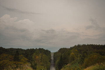 Straight Uphill Road Leading into the Sky