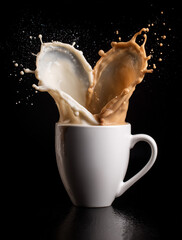A white coffee cup with splashes of brown and milk forming a heart in the air — a symbol of warmth, love, and morning coziness. Against a dark background, the droplets stand out vividly, emphasizing 
