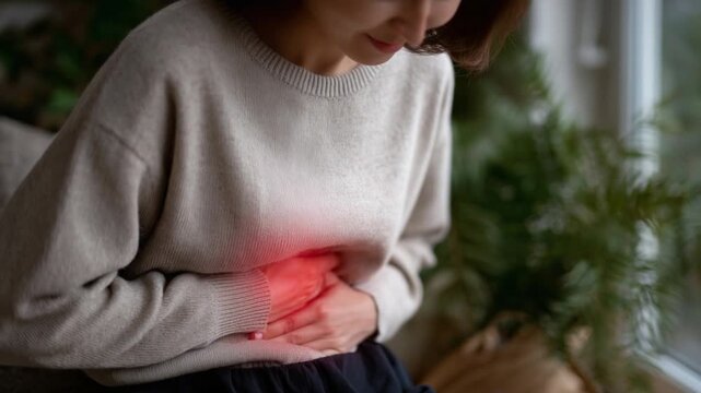 Illustration of a woman experiencing pelvic pain, highlighting reproductive health disorder awareness.