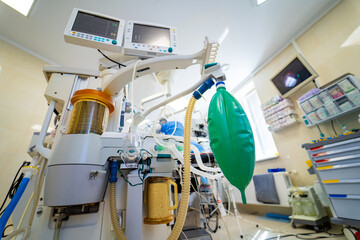 Medical anesthesia machine in hospital operating room. Advanced anesthesia and breathing equipment in a hospital operating room prepared for surgery.